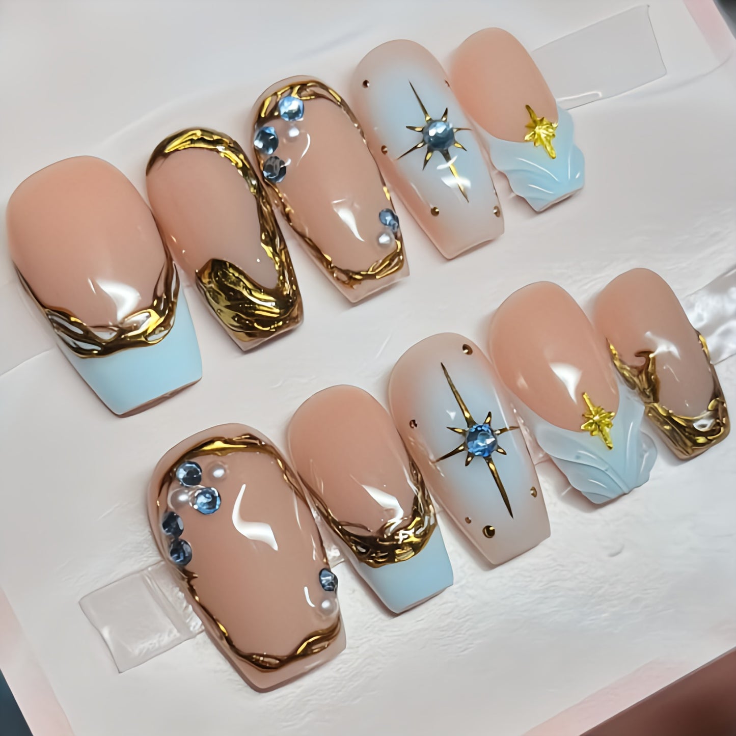 Nude and Baby Blue Press On Nails with Gold Chrome, Blue Rhinestones & Star Charms tns5386