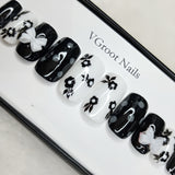 The NailzStation Glossy Black and White 3D Floral Press on Fake Artificial Nails Set with glue, filer, sticker application kit // 1045