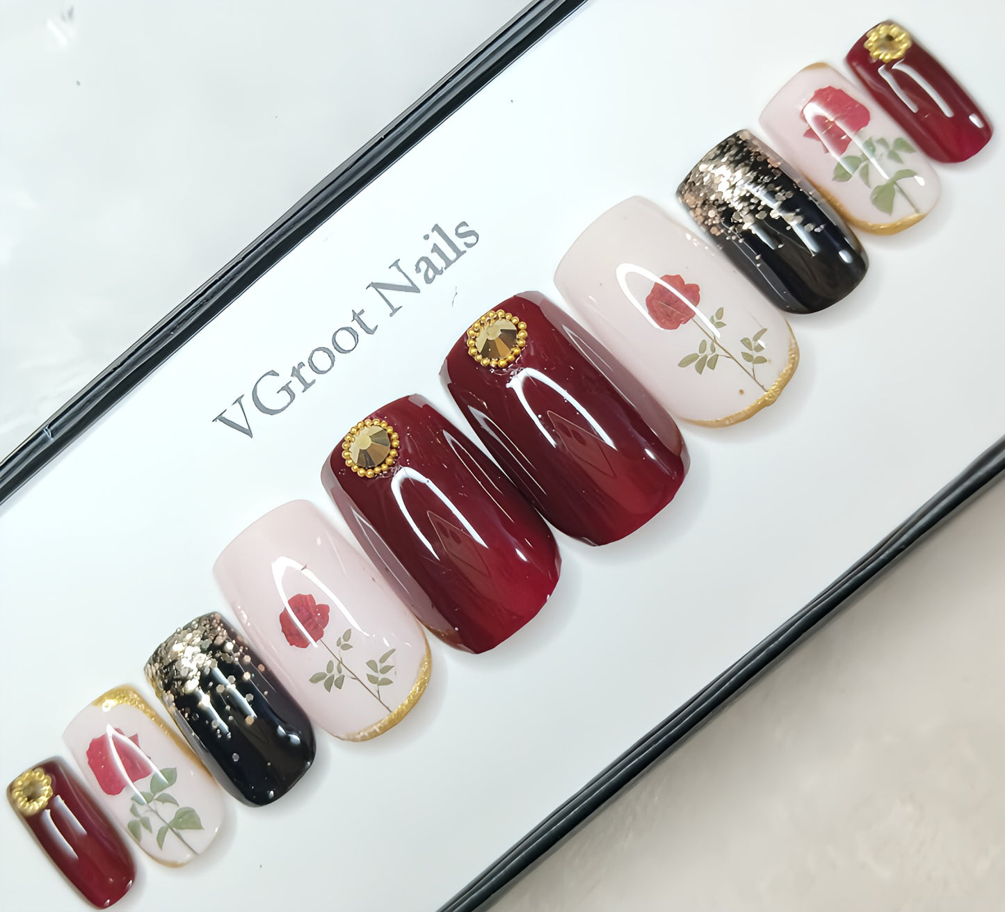 The NailzStation Glossy Maroon Floral Press on Fake Artificial Nails Set with glue, filer, sticker application kit // 1043