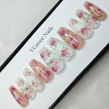 The NailzStation Glossy Nude and White Floral Press on Fake Artificial Nails Set with glue, filer, sticker application kit // 1034