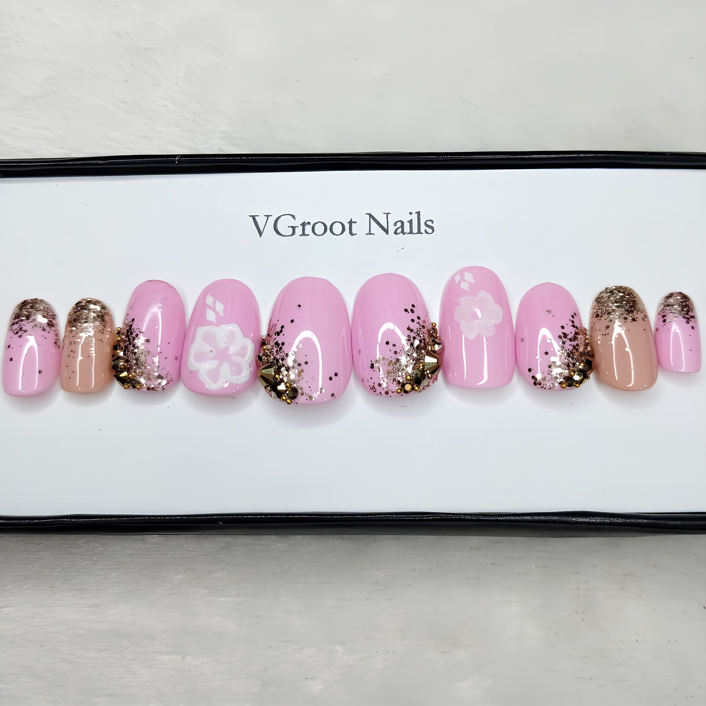 The NailzStation Glossy Light Pink Floral Press on Fake Artificial Nails Set with glue, filer, sticker application kit // 1084