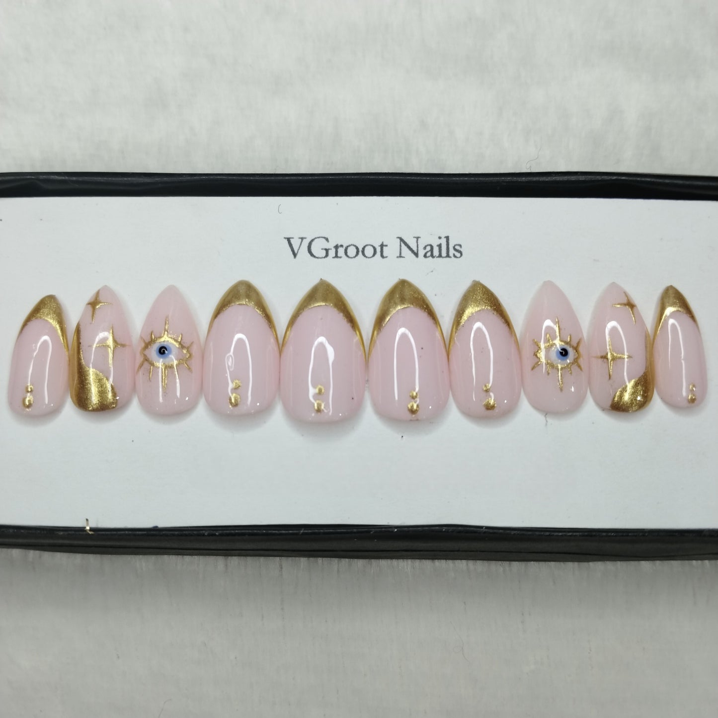 The NailzStation Glossy Chrome Evil Eye Press on Fake Artificial Nails Set with glue, filer, sticker application kit // 1123