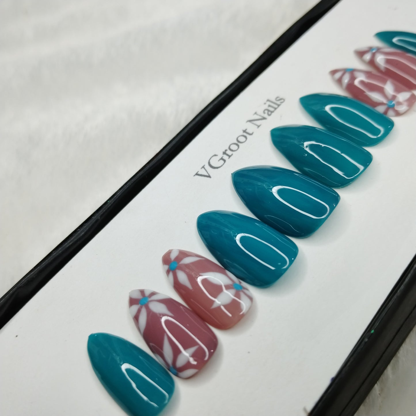 The NailzStation Glossy Light Blue Floral Press on Fake Artificial Nails Set with glue, filer, sticker application kit // 1113