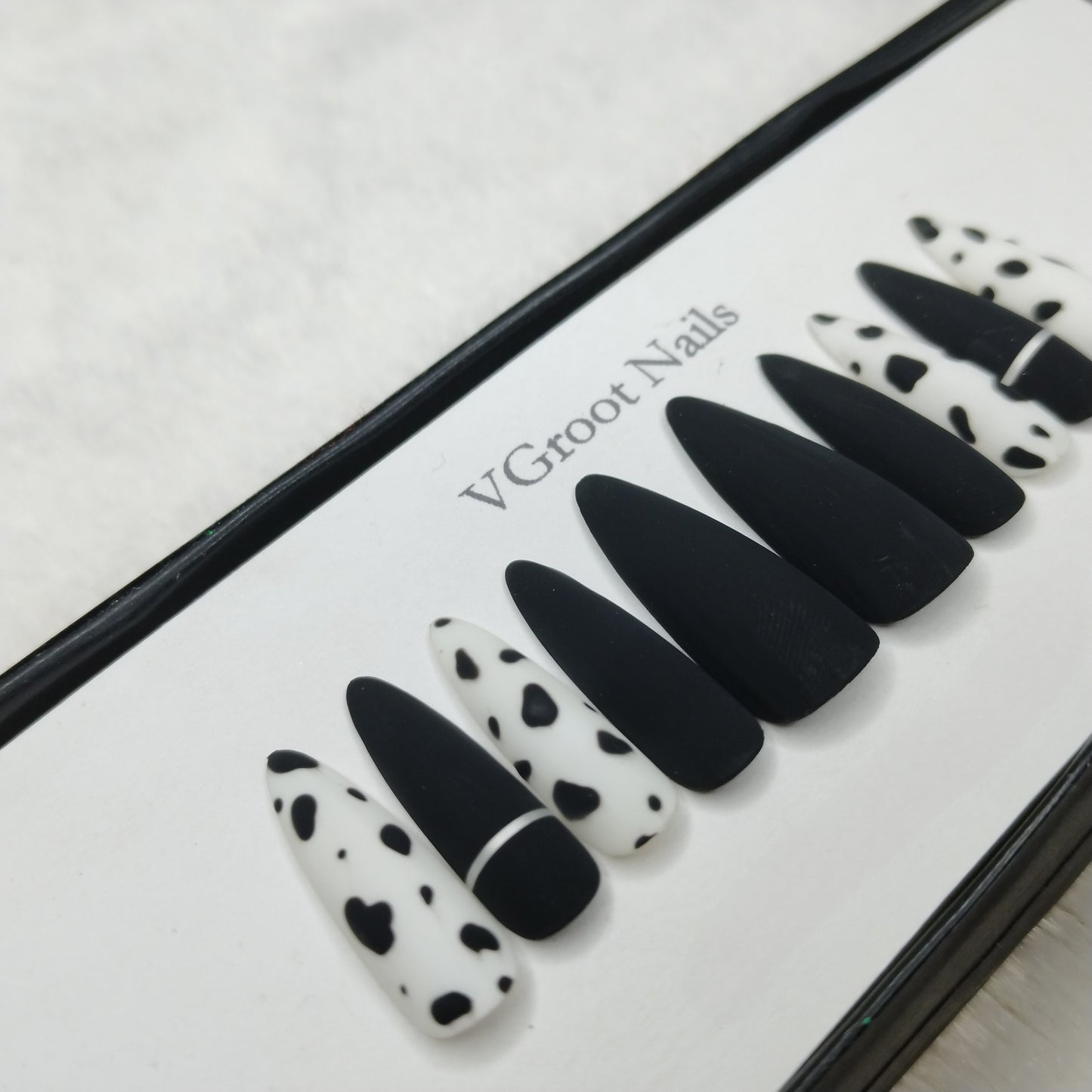 The NailzStation Matte Black Cow Print Press on Fake Artificial Nails Set with glue, filer, sticker application kit // 1108