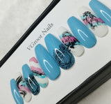 The NailzStation Glossy Light Blue Printed Press on Fake Artificial Nails Set with glue, filer, sticker application kit // 1107