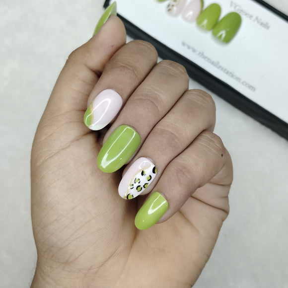 The NailzStation Glossy Light Green Animal Print Press on Fake Artificial Nails Set with glue, filer, sticker application kit // 1106