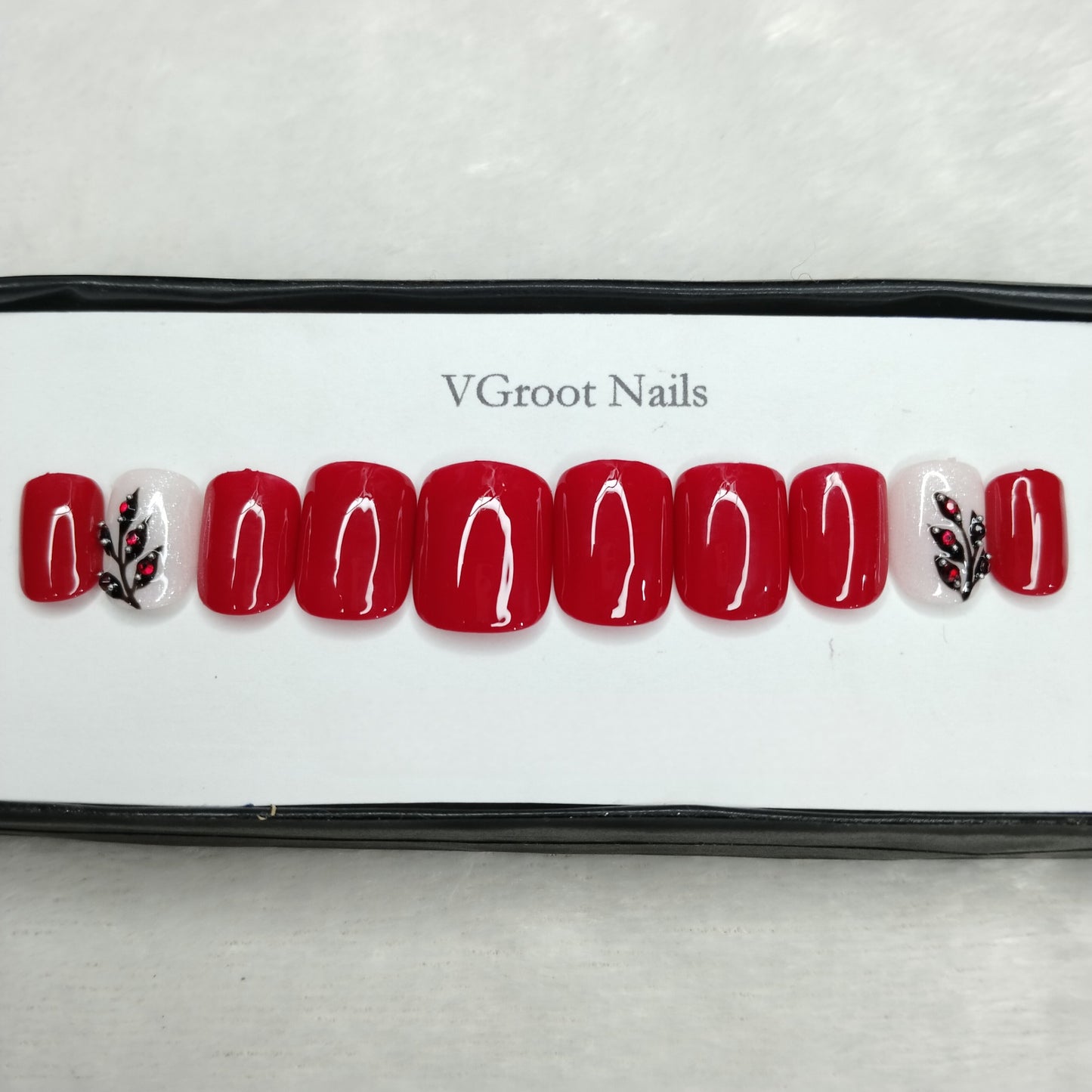 The NailzStation Glossy Red Floral Studded Press on Fake Artificial Nails Set with glue, filer, sticker application kit // 1102