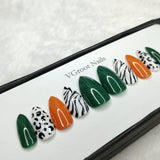 The NailzStation Glossy Green Animal Print Press on Fake Artificial Nails Set with glue, filer, sticker application kit // 1101