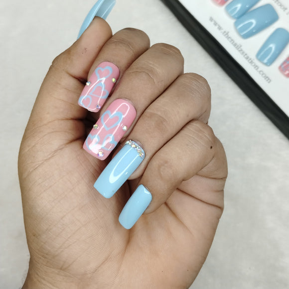 The NailzStation Glossy Light Blue Hearts Press on Fake Artificial Nails Set with glue, filer, sticker application kit // 1100