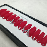 The NailzStation Matte Red Studded Press on Fake Artificial Nails Set with glue, filer, sticker application kit // 1093