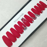 The NailzStation Matte Red Studded Press on Fake Artificial Nails Set with glue, filer, sticker application kit // 1093