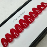 The NailzStation Glossy Plain Red Press on Fake Artificial Nails Set with glue, filer, sticker application kit // 1090