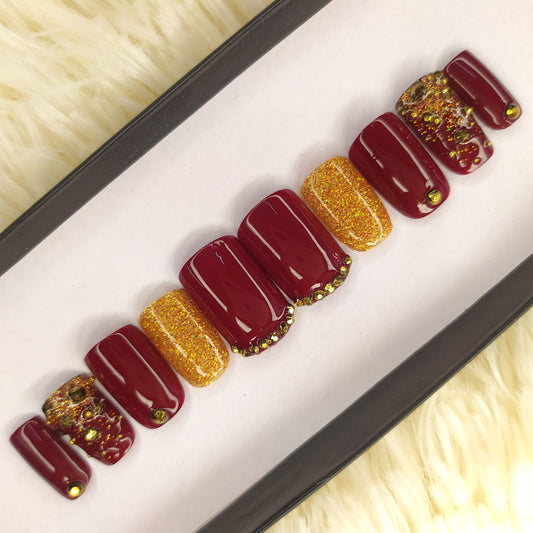 The NailzStation Glossy Maroon Studded Press on Fake Artificial Nails Set with glue, filer, sticker application kit // 1340