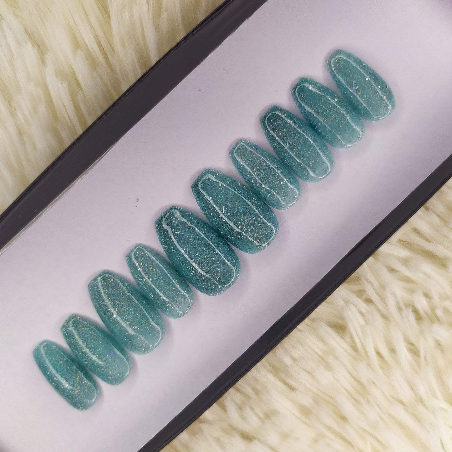 The NailzStation Glossy Light Blue Glitter Press on Fake Artificial Nails Set with glue, filer, sticker application kit // 1341