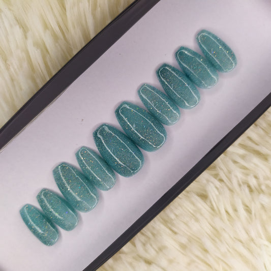 The NailzStation Glossy Light Blue Glitter Press on Fake Artificial Nails Set with glue, filer, sticker application kit // 1341