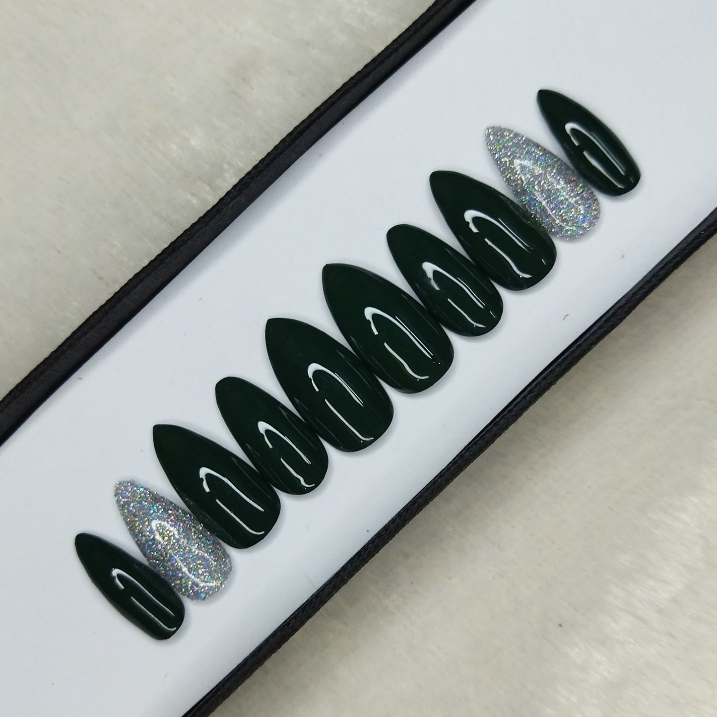 The NailzStation Glossy Dark Green Glitter Press on Fake Artificial Nails Set with glue, filer, sticker application kit // 1315