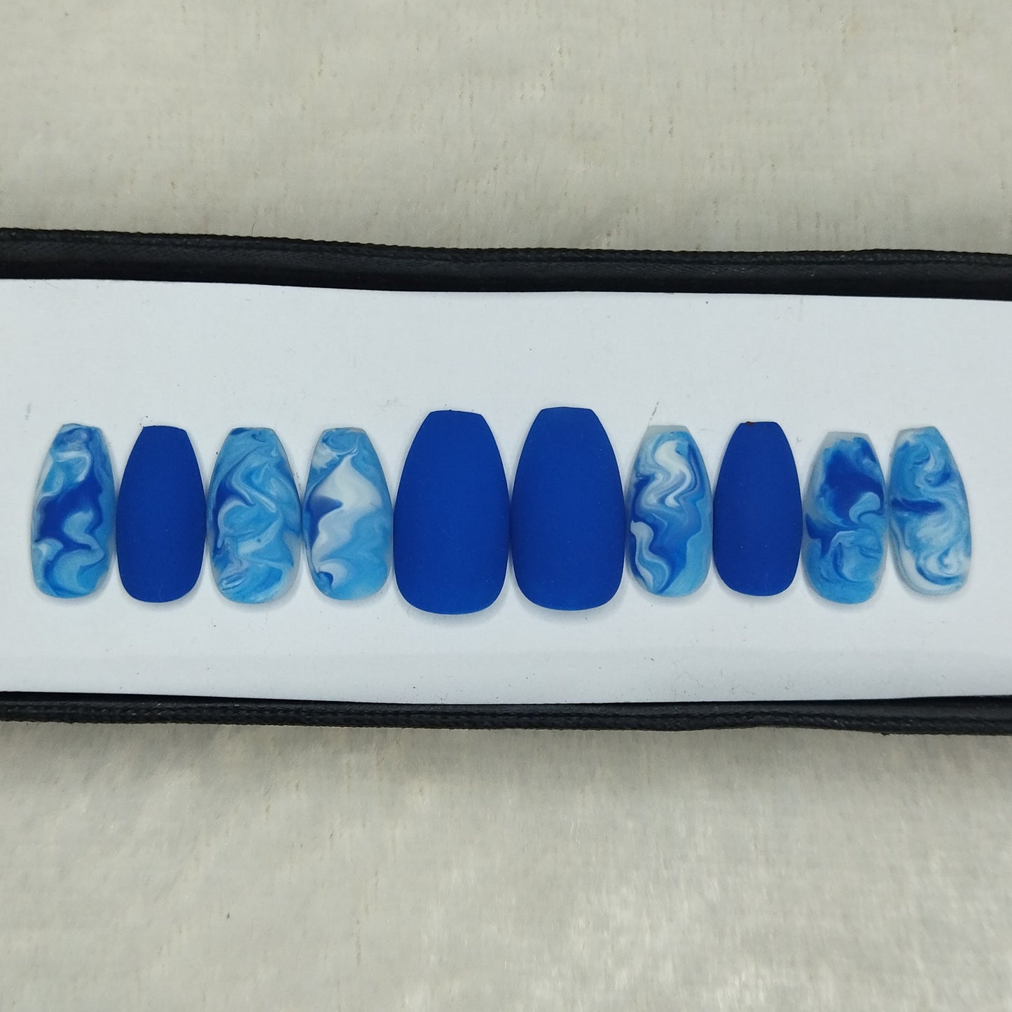 The NailzStation Matte Blue Marble Press on Fake Artificial Nails Set with glue, filer, sticker application kit // 1391