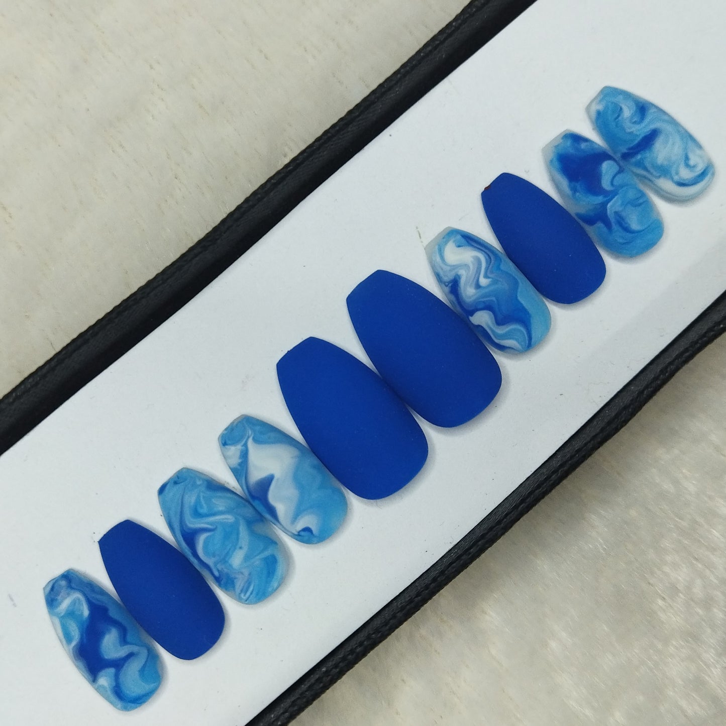 The NailzStation Matte Blue Marble Press on Fake Artificial Nails Set with glue, filer, sticker application kit // 1391