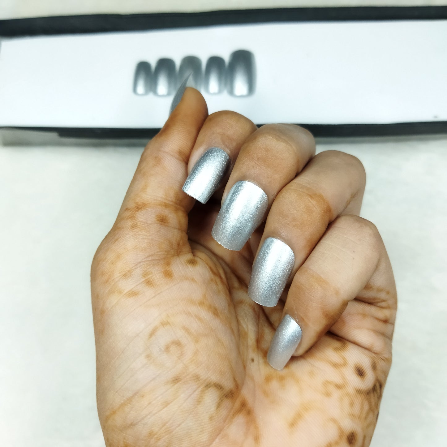 The NailzStation Glossy Silver Press on Fake Artificial Nails Set with glue, filer, sticker application kit // 1278