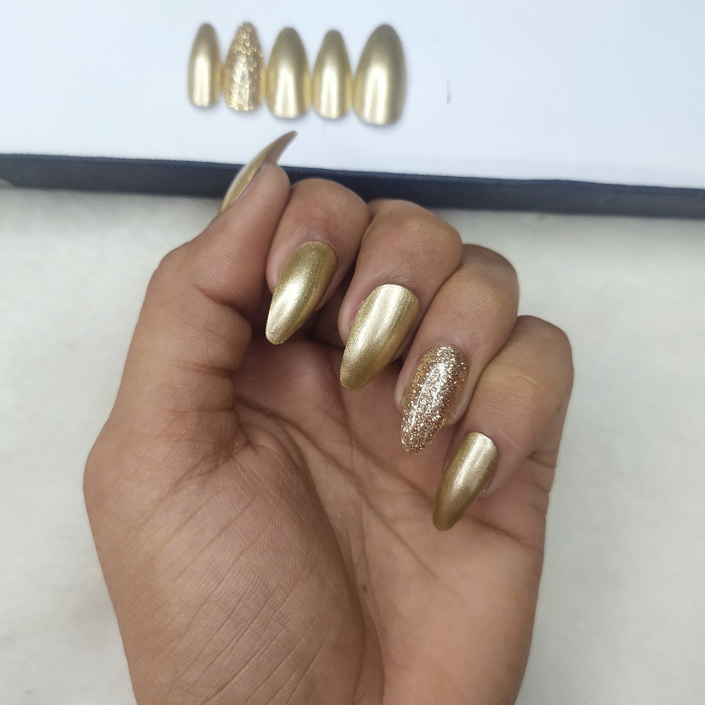 The NailzStation Glossy Golden Glitter Press on Fake Artificial Nails Set with glue, filer, sticker application kit // 1312