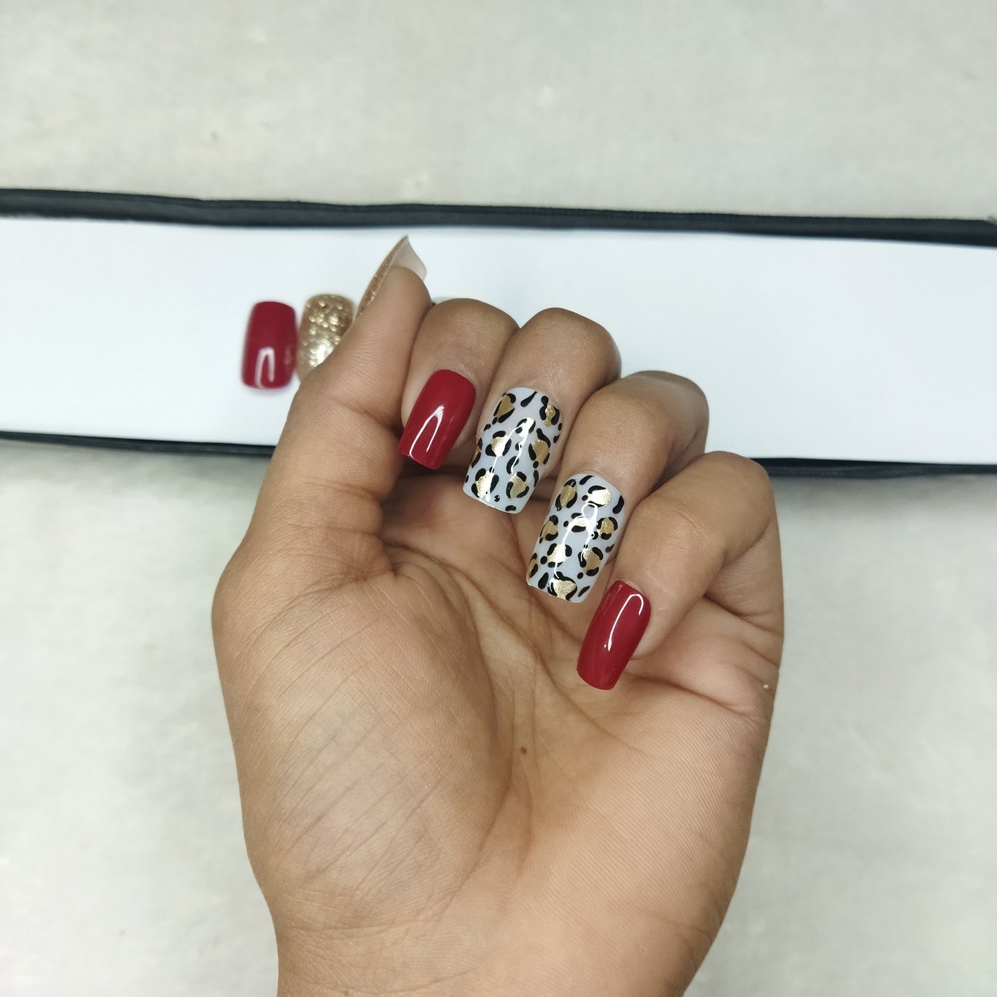 The NailzStation Glossy Red Animal Print Press on Fake Artificial Nails Set with glue, filer, sticker application kit // 1311