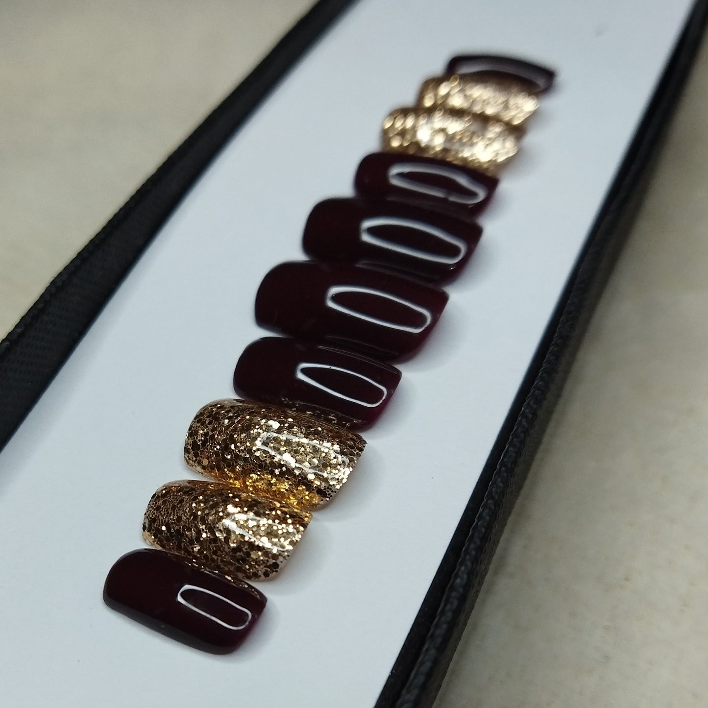 The NailzStation Glossy Dark Maroon Glitter Press on Fake Artificial Nails Set with glue, filer, sticker application kit // 1310