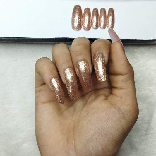 The NailzStation Glossy Golden Press on Fake Artificial Nails Set with glue, filer, sticker application kit // 1285