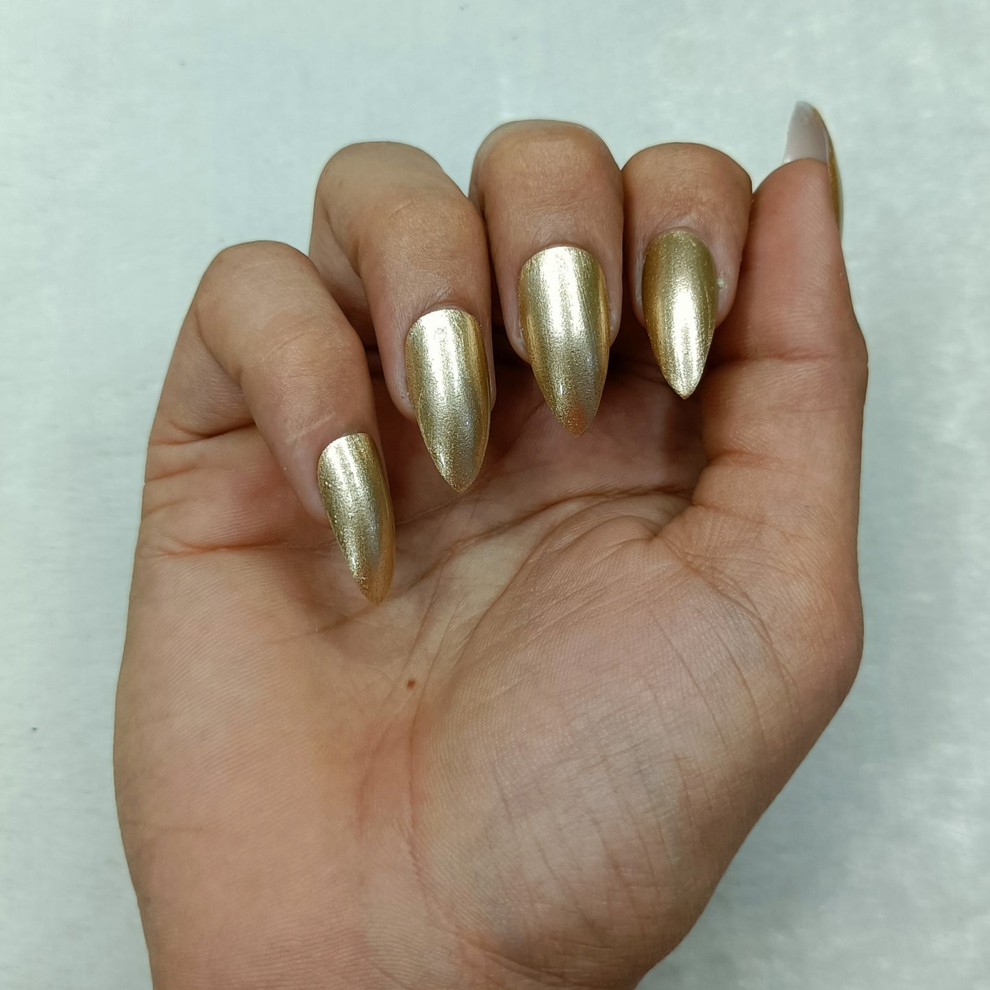 The NailzStation Glossy Golden Press on Fake Artificial Nails Set with glue, filer, sticker application kit // 1284