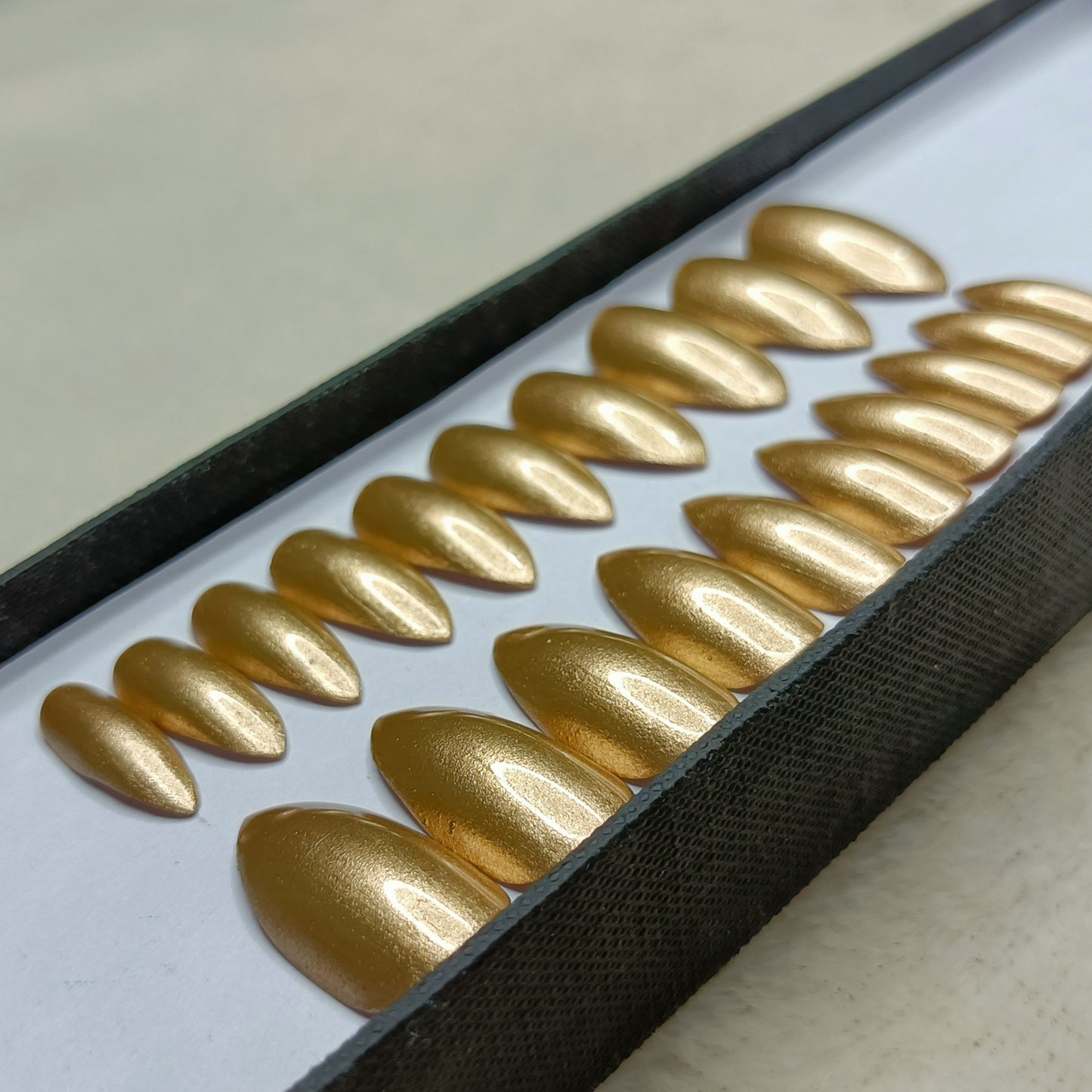 The NailzStation Glossy Golden Press on Fake Artificial Nails Set with glue, filer, sticker application kit // 1284