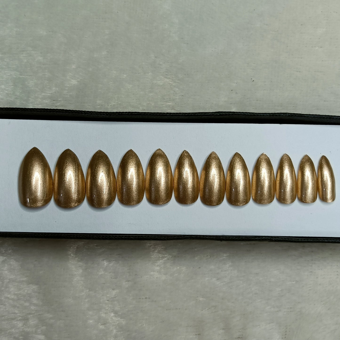 The NailzStation Glossy Golden Press on Fake Artificial Nails Set with glue, filer, sticker application kit // 1284