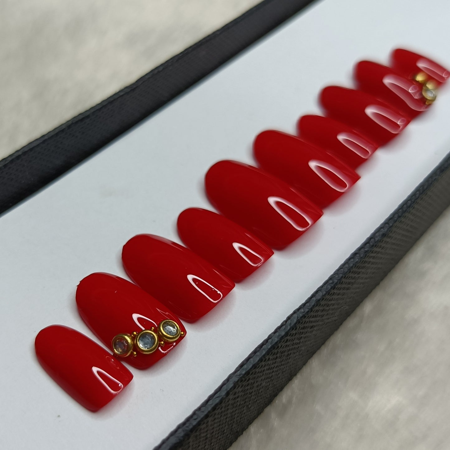 The NailzStation Glossy Red Kundan Bridal Press on Fake Artificial Nails Set with glue, filer, sticker application kit // 1292