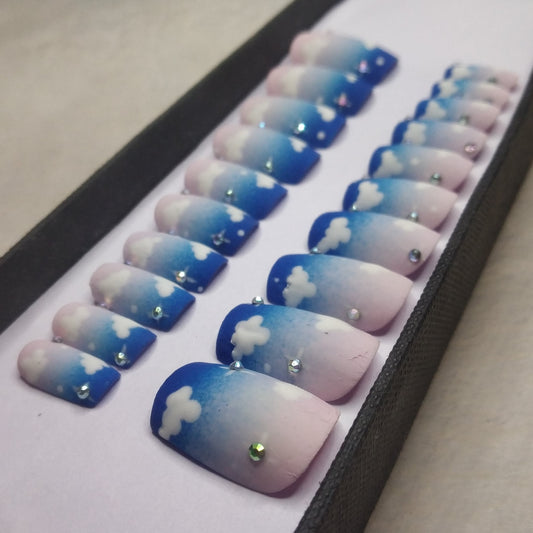 The NailzStation Matte Blue Clouds Press on Fake Artificial Nails Set with glue, filer, sticker application kit // 1300