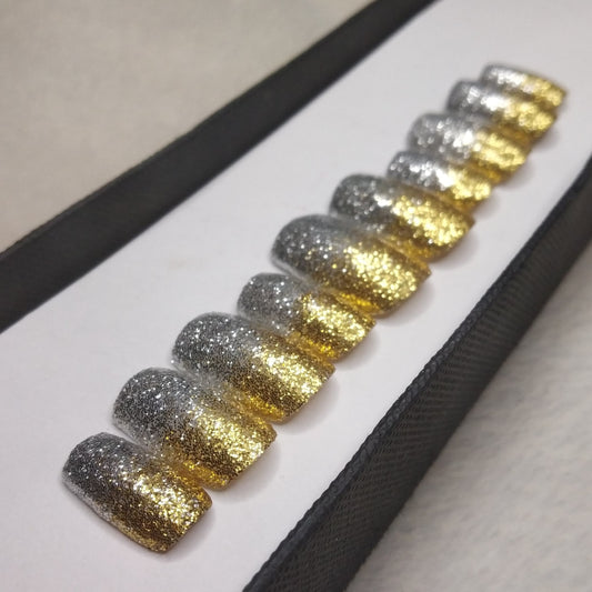 The NailzStation Glossy Silver and Golden Glitter Press on Fake Artificial Nails Set with glue, filer, sticker application kit // 1299