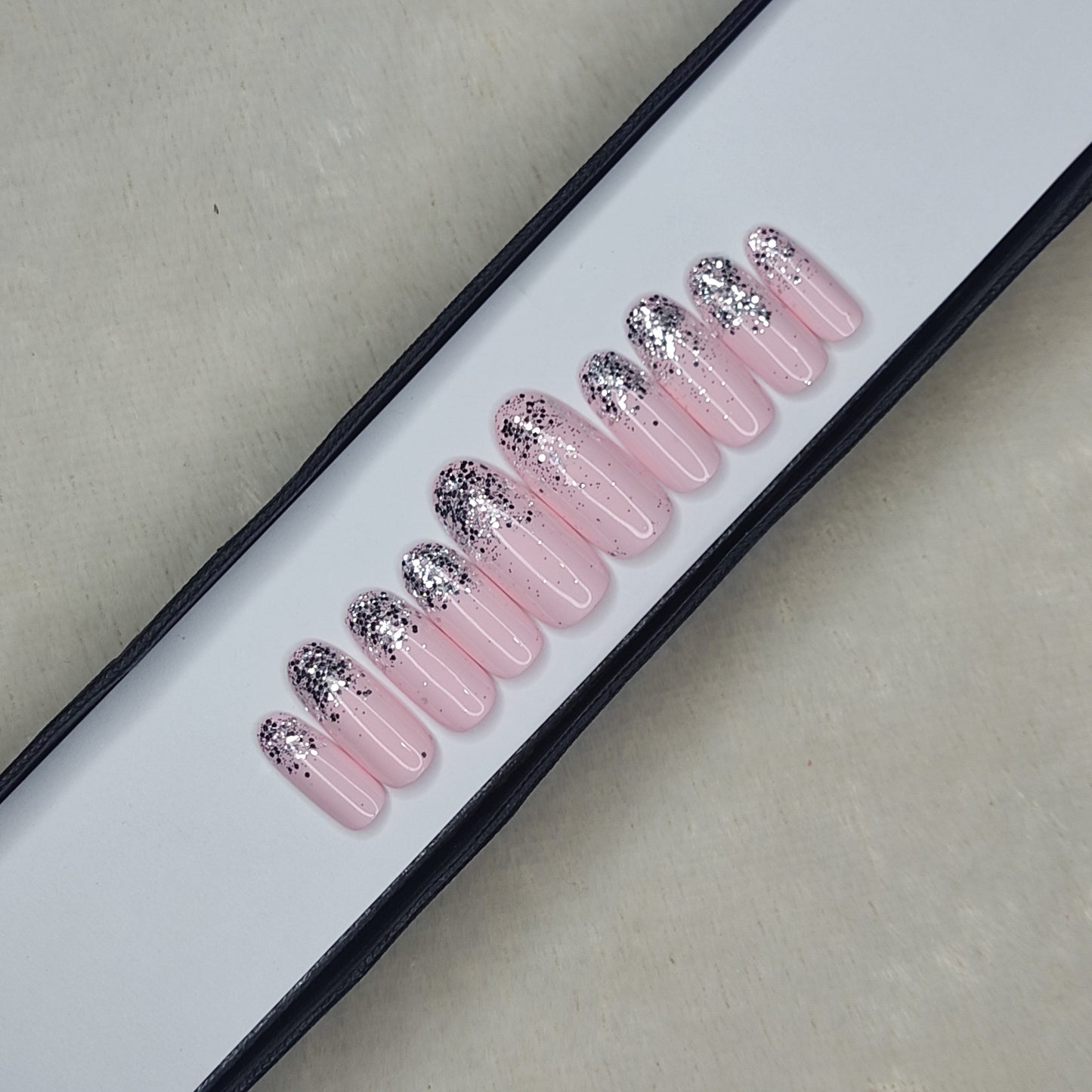 The NailzStation Glossy Light Pink Glitter Ombre Press on Fake Artificial Nails Set with glue, filer, sticker application kit // 1298