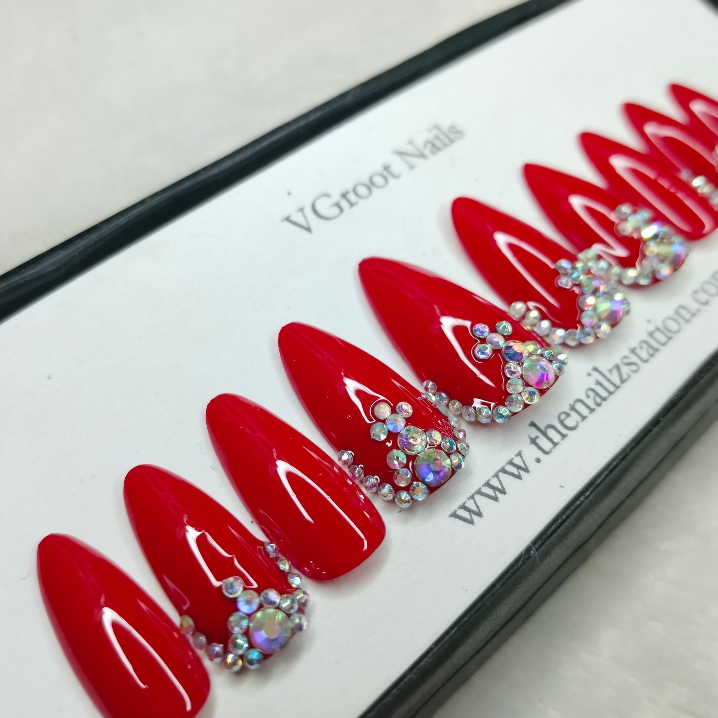 The NailzStation Glossy Red Studded Press on Fake Artificial Nails Set with glue, filer, sticker application kit // 1177