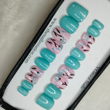 The NailzStation Glossy Light Blue Floral Press on Fake Artificial Nails Set with glue, filer, sticker application kit // 1178