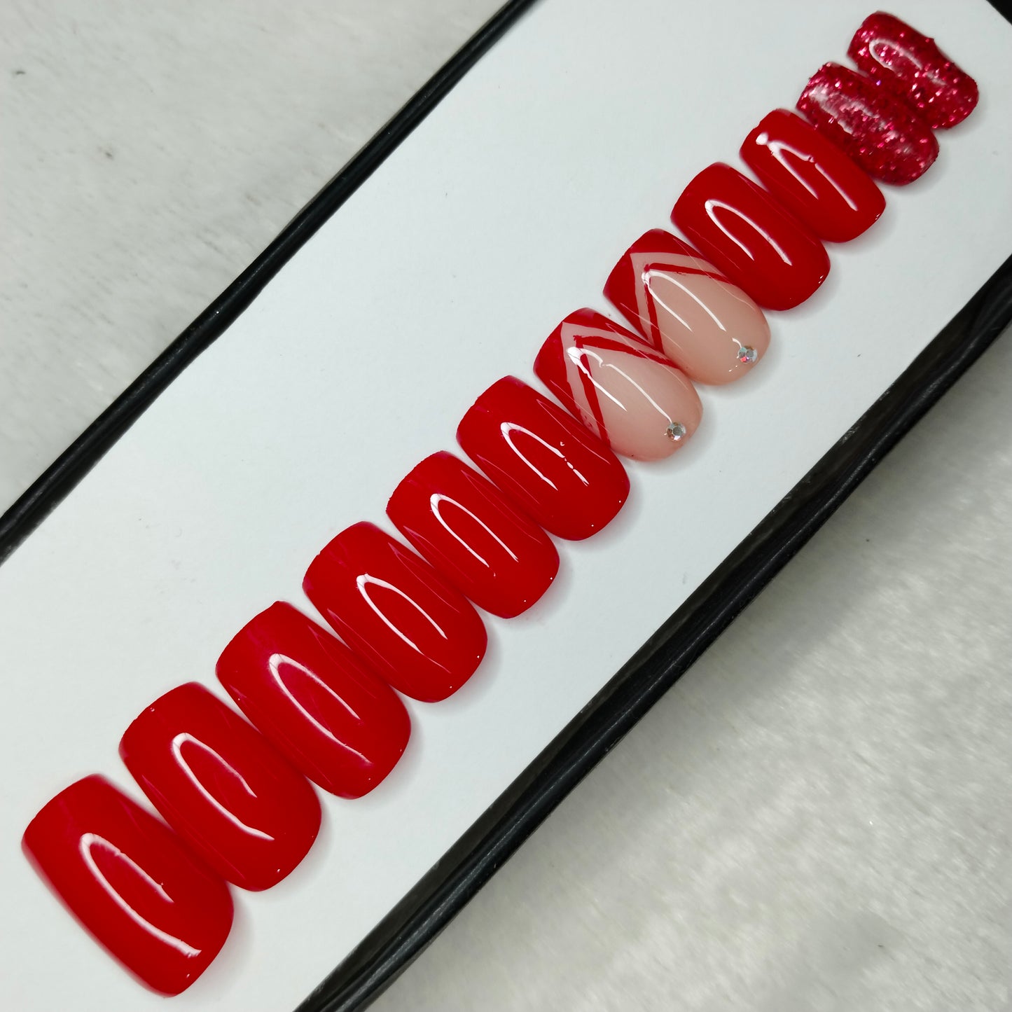 The NailzStation Glossy Red French Press on Fake Artificial Nails Set with glue, filer, sticker application kit // 1209