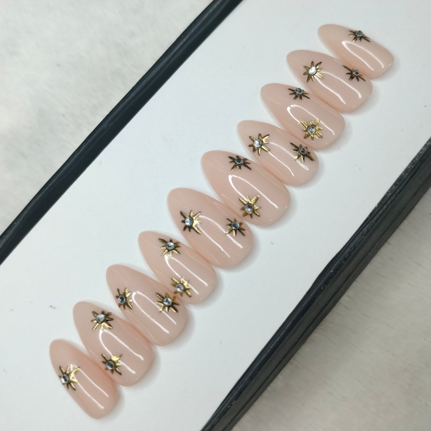 The NailzStation Glossy 3D Chrome Stars Press on Fake Artificial Nails Set with glue, filer, sticker application kit // 1222