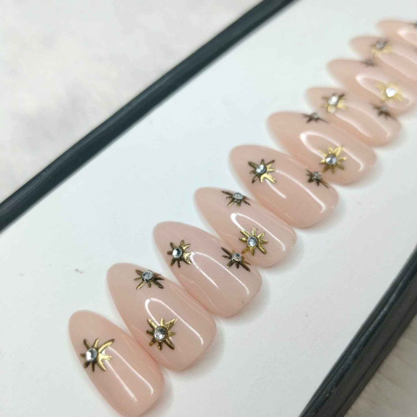 The NailzStation Glossy 3D Chrome Stars Press on Fake Artificial Nails Set with glue, filer, sticker application kit // 1222