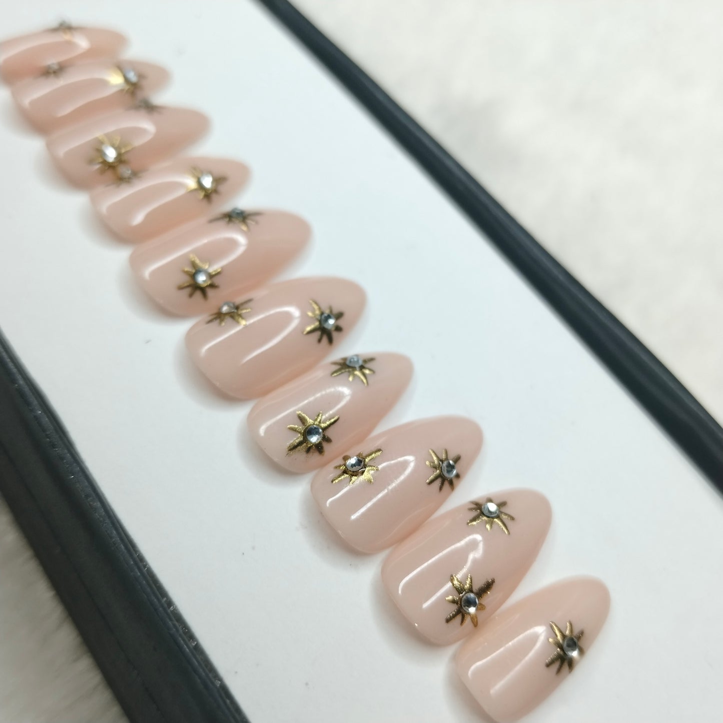 The NailzStation Glossy 3D Chrome Stars Press on Fake Artificial Nails Set with glue, filer, sticker application kit // 1222