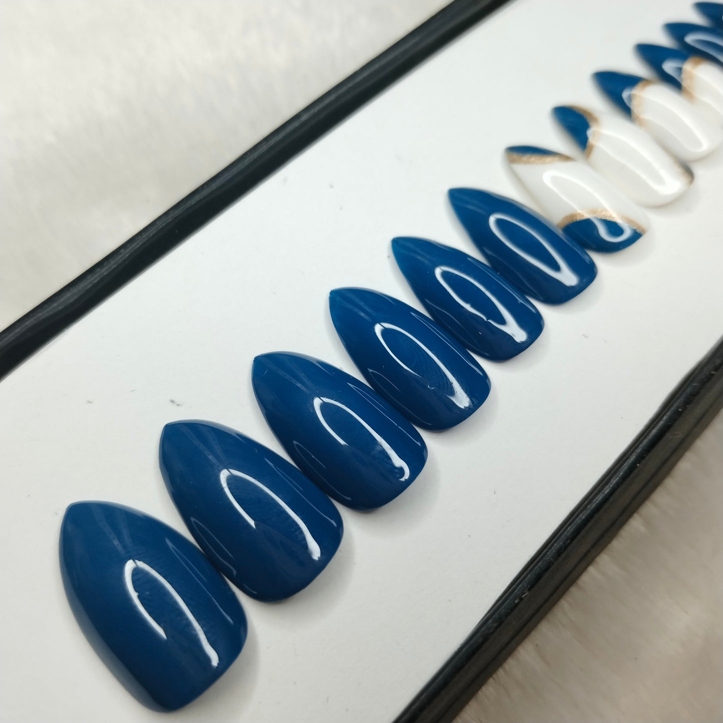 The NailzStation Glossy Blue Swirls Press on Fake Artificial Nails Set with glue, filer, sticker application kit // 1223