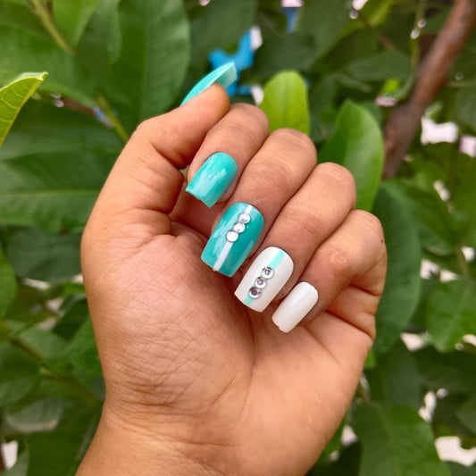 The NailzStation Glossy Light Blue Studded Press on Fake Artificial Nails Set with glue, filer, sticker application kit // 1227