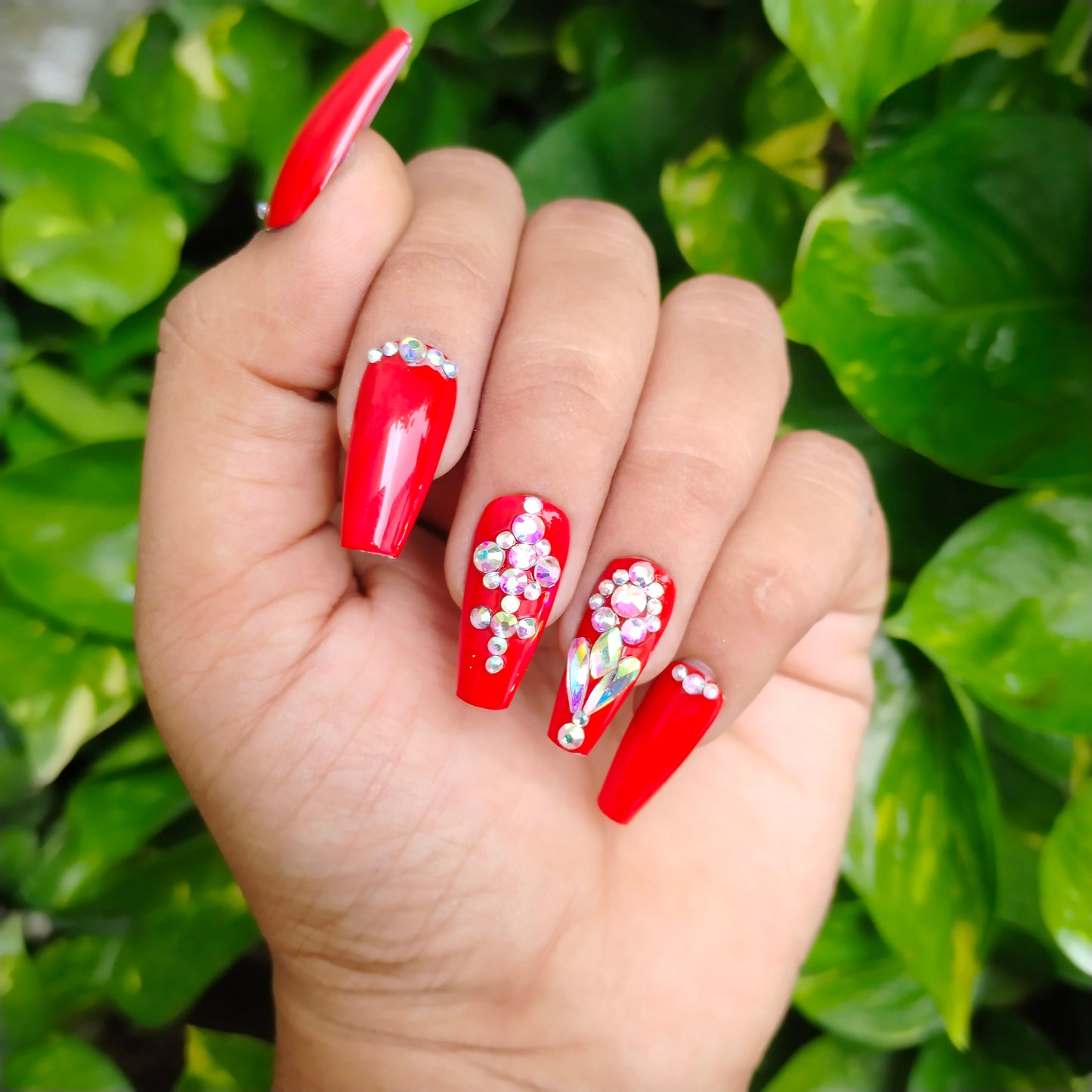 The NailzStation Glossy Red Studded Press on Fake Artificial Nails Set with glue, filer, sticker application kit // 1230