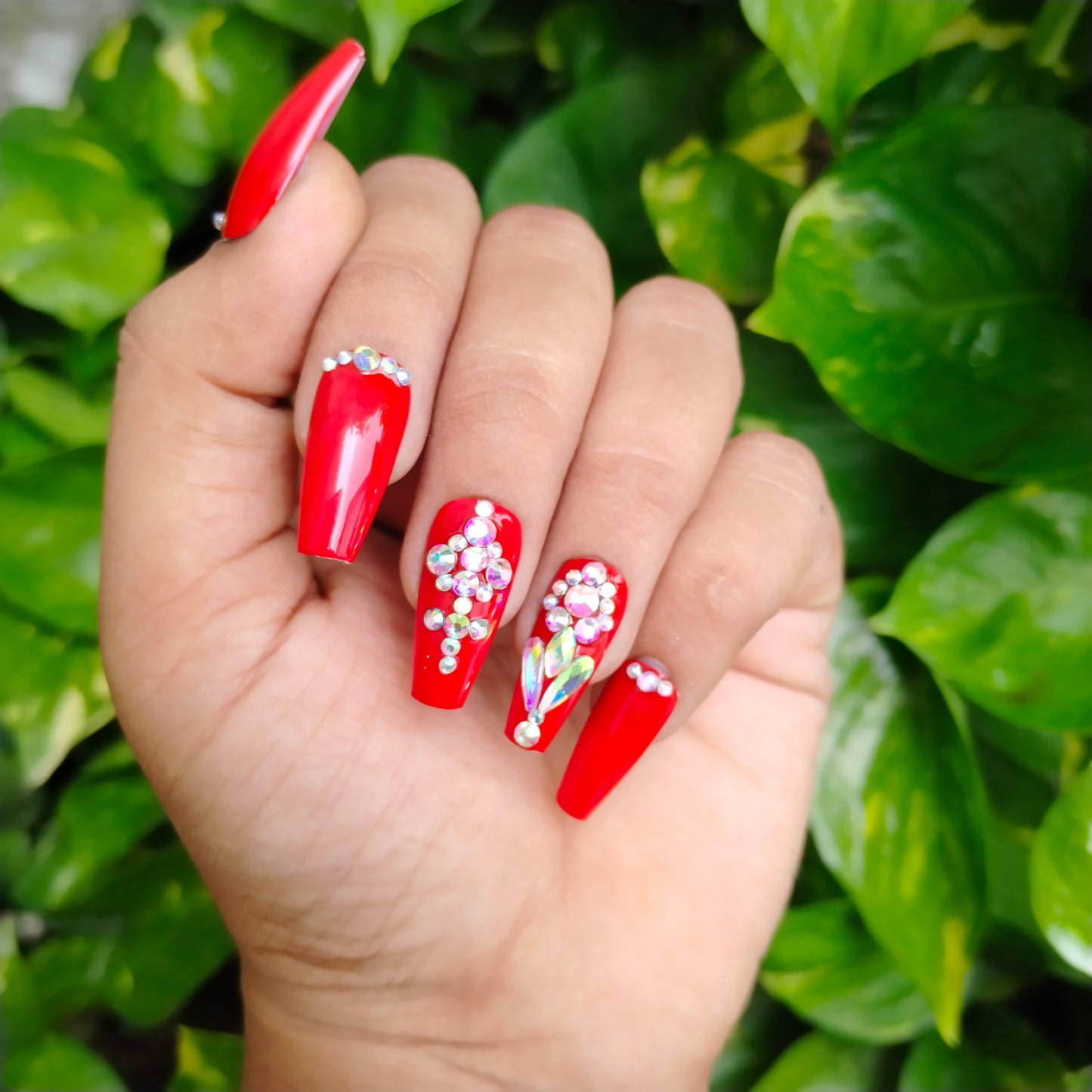 The NailzStation Glossy Red Studded Press on Fake Artificial Nails Set with glue, filer, sticker application kit // 1230