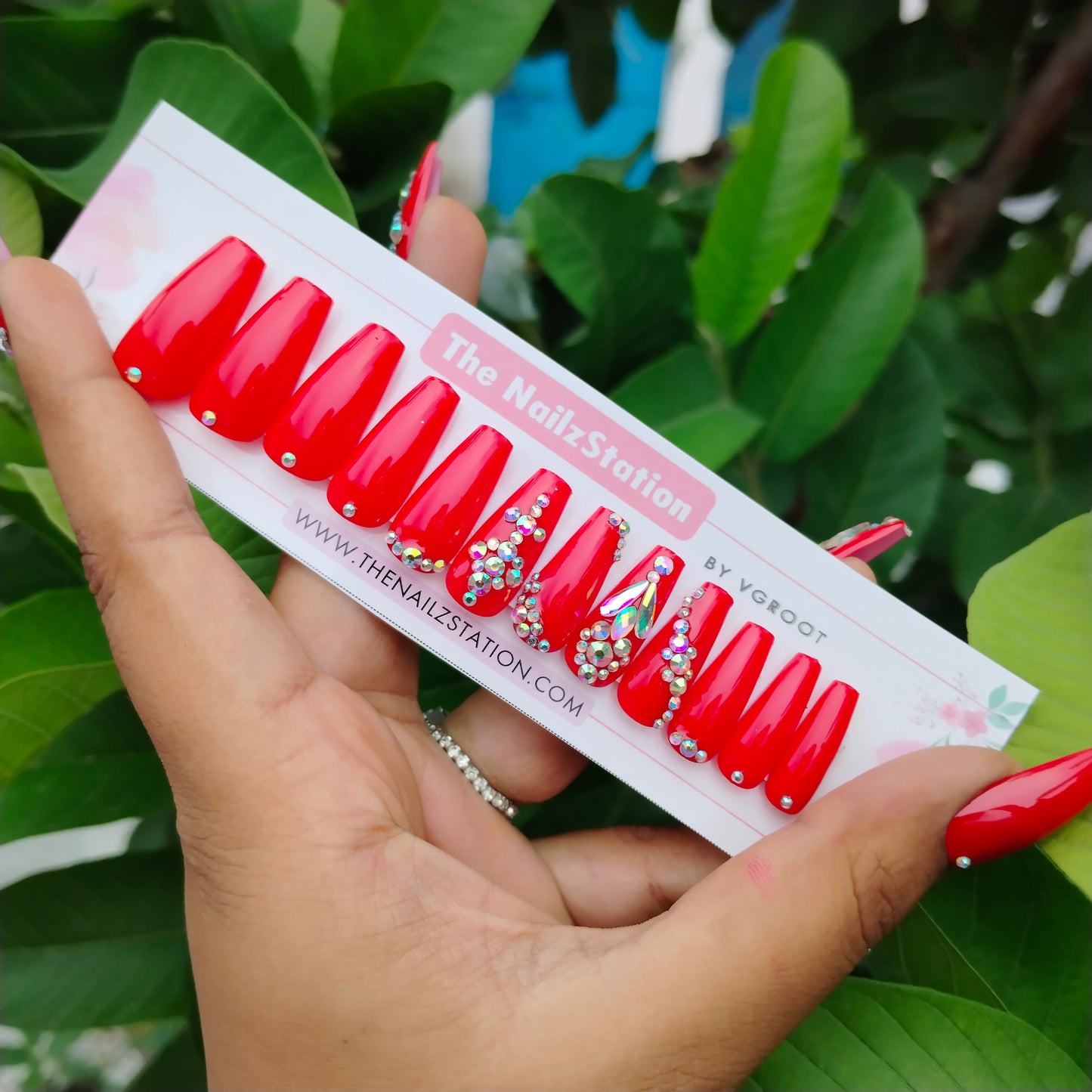 The NailzStation Glossy Red Studded Press on Fake Artificial Nails Set with glue, filer, sticker application kit // 1230