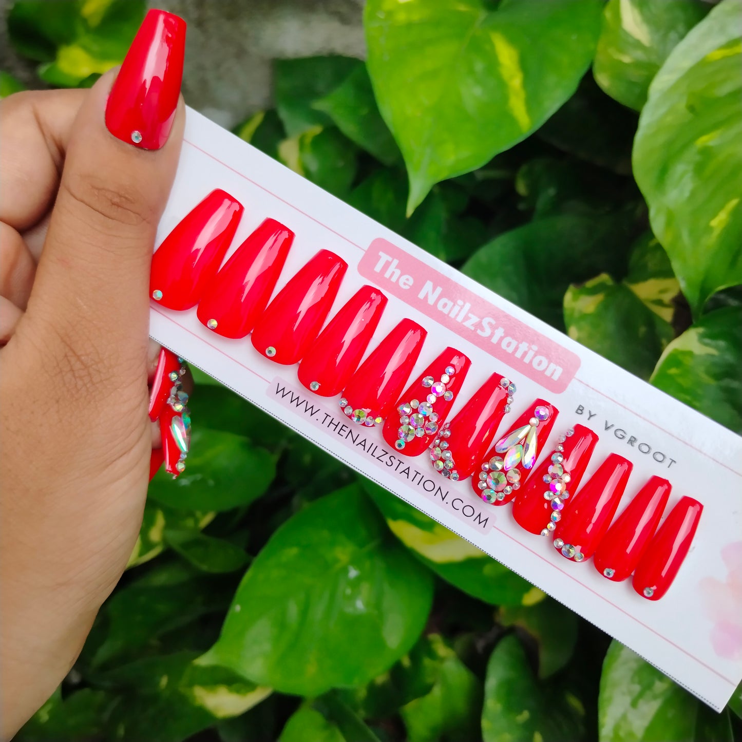 The NailzStation Glossy Red Studded Press on Fake Artificial Nails Set with glue, filer, sticker application kit // 1230