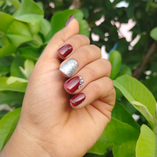 The NailzStation Glossy Maroon Studded Glitter Press on Fake Artificial Nails Set with glue, filer, sticker application kit // 1250
