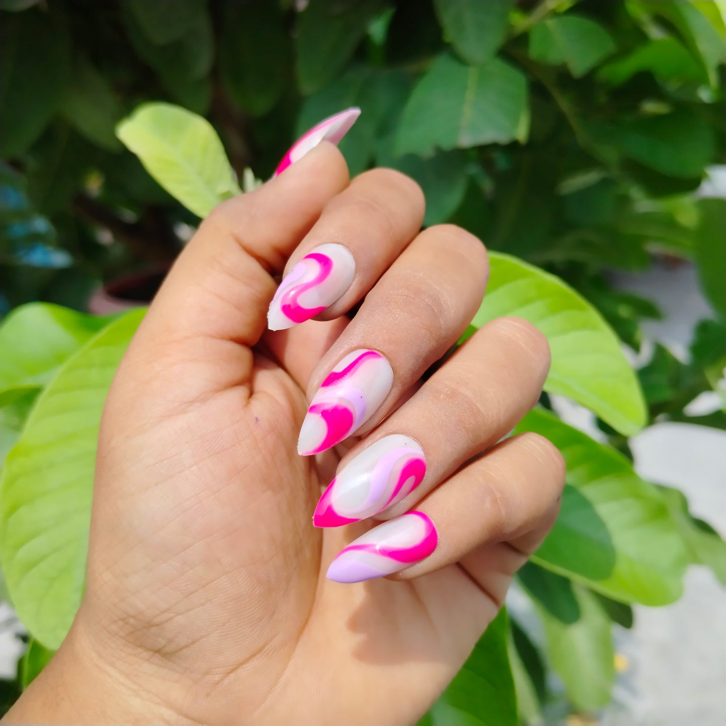 The NailzStation Glossy Pink Swirls Press on Fake Artificial Nails Set with glue, filer, sticker application kit // 1269