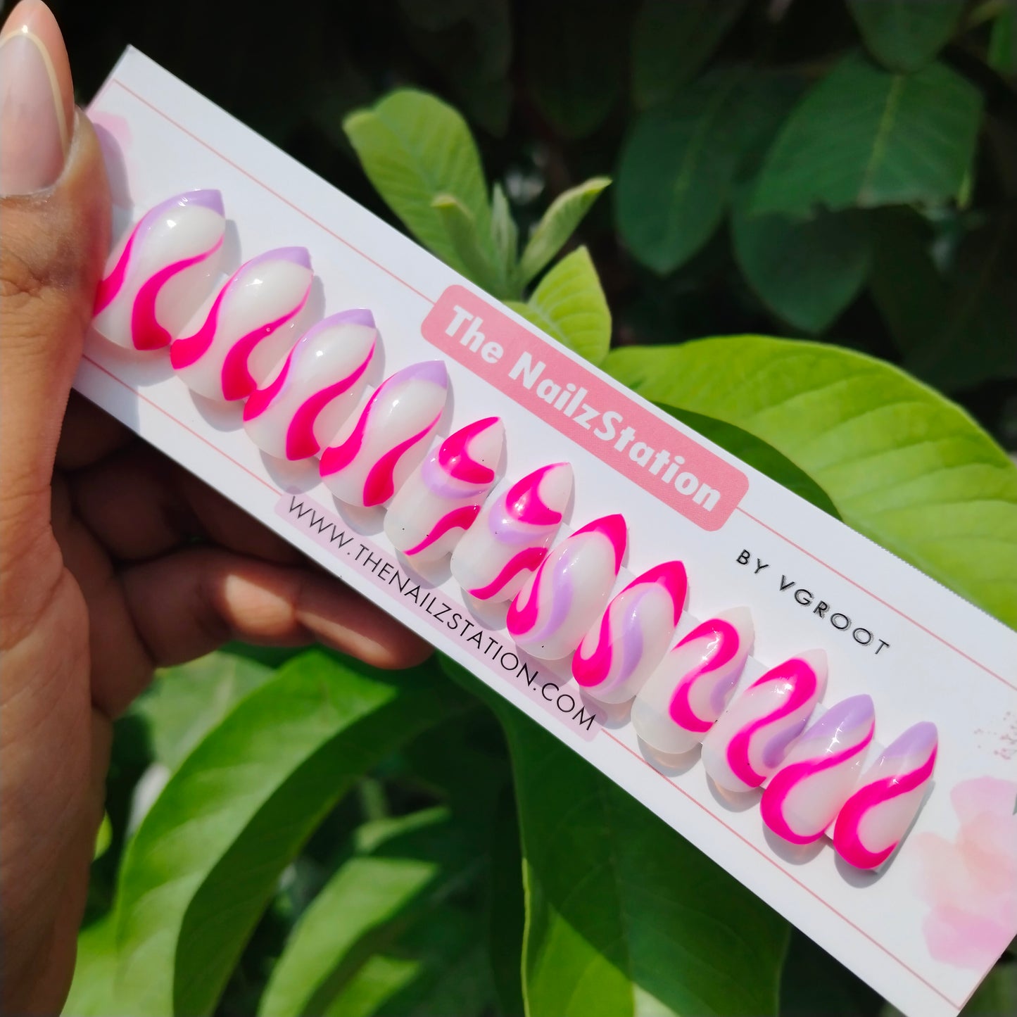 The NailzStation Glossy Pink Swirls Press on Fake Artificial Nails Set with glue, filer, sticker application kit // 1269