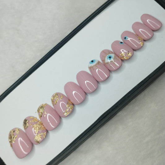 The NailzStation Glossy Nude Evil Eye Press on Fake Artificial Nails Set with glue, filer, sticker application kit // 1233